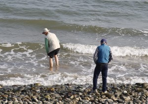 Fred wadding in Irish Sea egged on by Ed