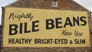 Advertisement on wall next to hotel